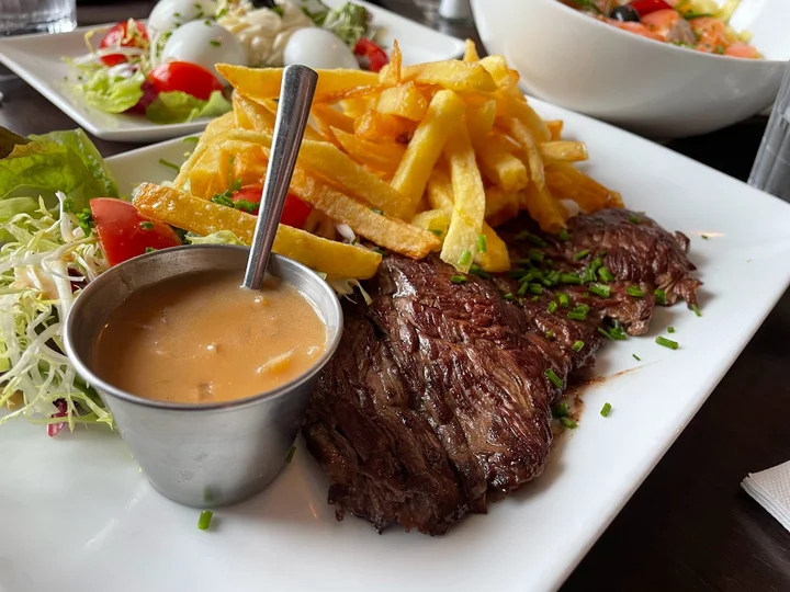 Le P'tit Bistrot signature dishes Assiette de FritesEscargotsSteak Tartare